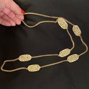 Gorgeous long statement necklace in gold with accents